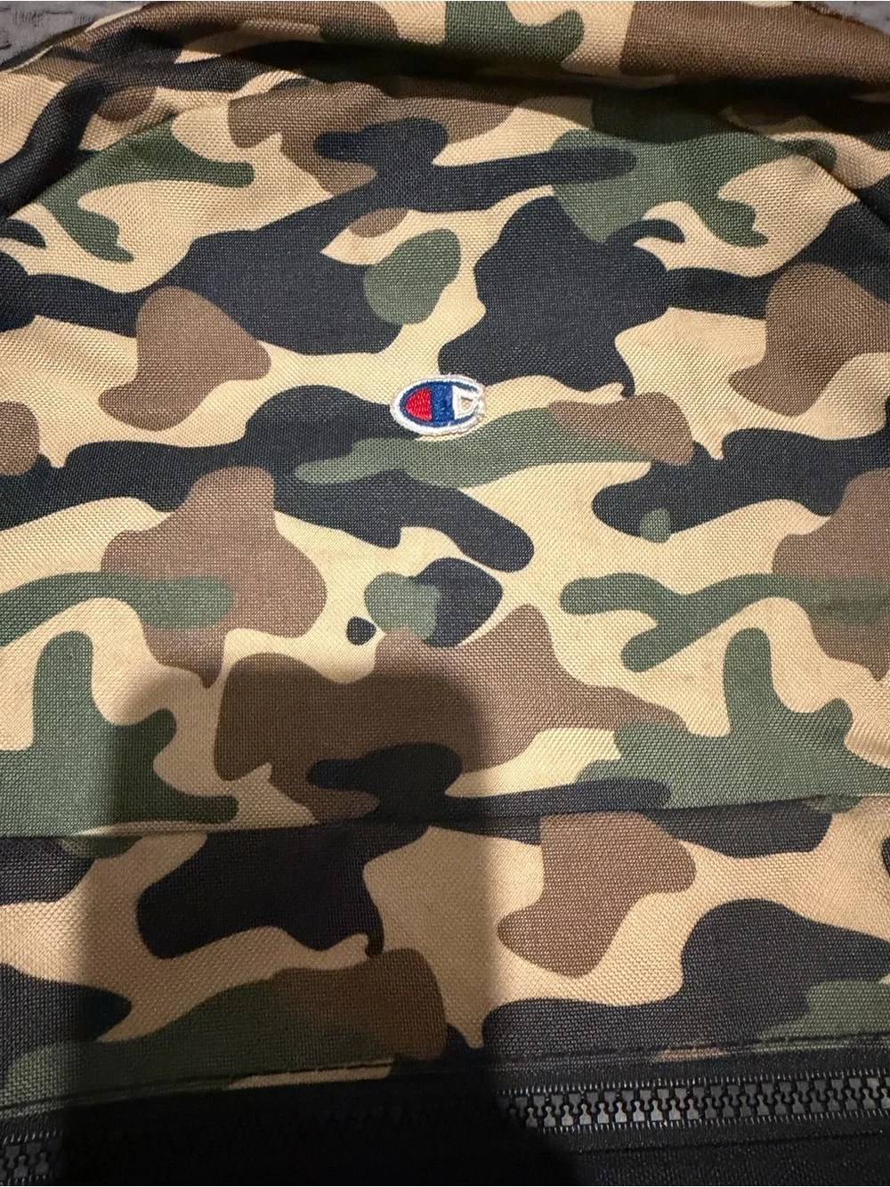 Champion “Manuscript” Camo Backpack Black Green Tan Camouflage.